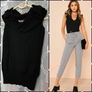 Black knit top with bow shoulders